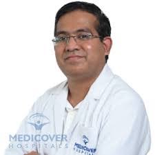 Dr Ashish Baviskar